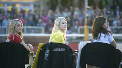 Speedway v PooleStart line girls watch the action