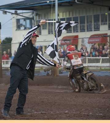 Speedway v PoolePeter Kildemand takes the flag.