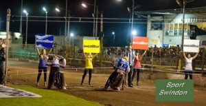 Speedway final first leg.Startline girls with Excalibur boards