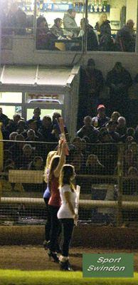 Speedway final first leg.Startline girls with Excalibur boards