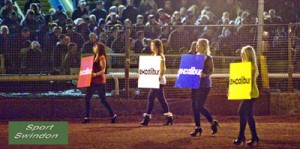 Speedway final first leg.Startline girls with Excalibur boards